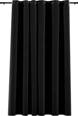 A black curtain hanging from a curtain rod.