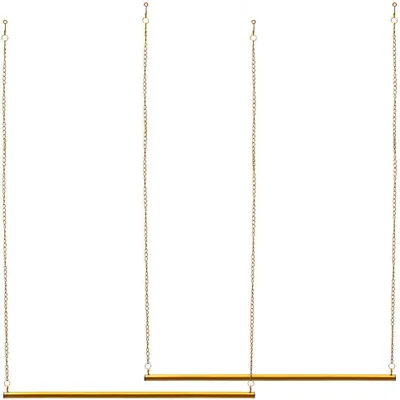 Two gold metal garment racks are shown hanging from chains against a white background.