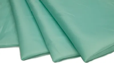 Produktbild von Futterstoff aus Polyester, leicht durchscheinend, Minze 50 x 150 cm