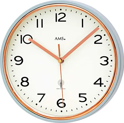 A close-up view of a round analog wall clock with a light gray frame and a white face.