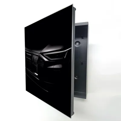 Produktbild von Schlüsselkasten Schwarz Metall, Audi Sportwagen Scheinwerfer Motiv hinter Glas, Moderne Schlüsselbox linksöffnend, 32x28x6,5 cm, 20 Haken für den Flur