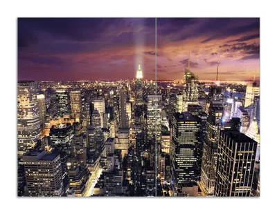 Produktbild von Wallario Herdabdeckplatte aus Glas, Größe 70 x 52 cm 2-teilig, Motiv New York bei Nacht - Panoramablick über die Stadt