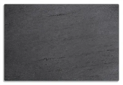 Produktbild von Wallario Frühstücksbrettchen aus Glas 20 x 30 cm mit rutschfesten Füßen, Motiv Schwarze Schiefertafel Optik - Steintafel