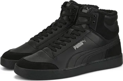 A pair of black Puma mid-top sneakers.