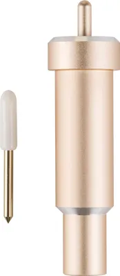 A gold cutting blade and its housing are shown against a white background.