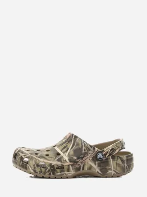 A single camouflage-patterned Crocs shoe is shown from the side against a white background.