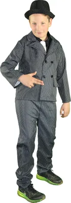A young boy is posing in a gangster costume.
