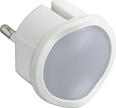 A close-up product shot of a white electrical adapter with a translucent light.