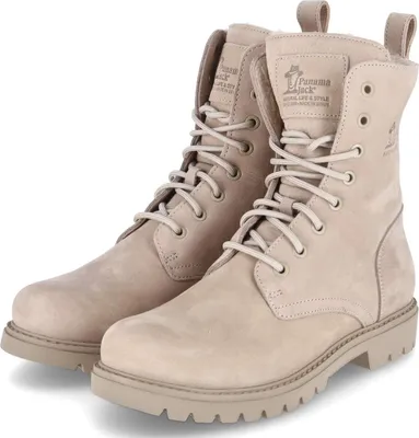 A pair of beige suede boots.