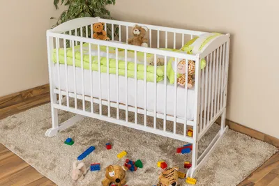 Produktbild von Babywiege aus Kiefer Massivholz weiß lackiert 60x120 cm höhenverstellbar