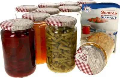 A collection of glass jars filled with preserved food items, along with a product information booklet.