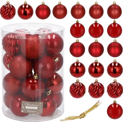 A collection of red Christmas ornaments in a clear plastic container, with additional ornaments displayed around it.