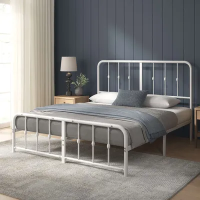 Zinus Metallbettgestell mit abgerundeten Ecken und grauer Bettwäsche in einem modernen Schlafzimmer