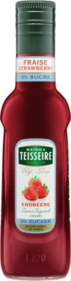 A bottle of strawberry syrup with a label.