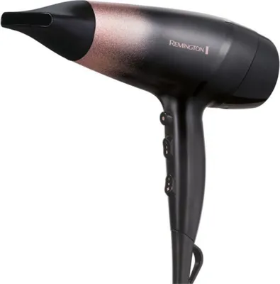 A black and rose gold Remington hair dryer is shown against a white background.
