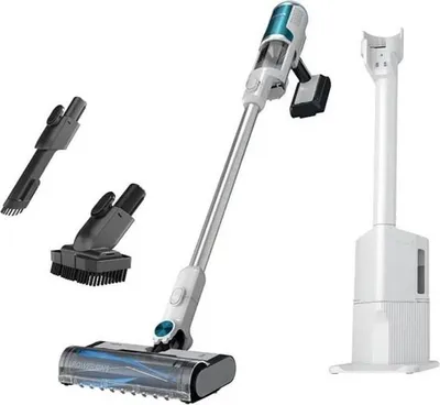 A cordless vacuum cleaner with its accessories and charging station are displayed against a white background.