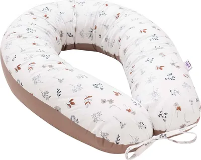 A V-shaped pillow with a floral pattern.