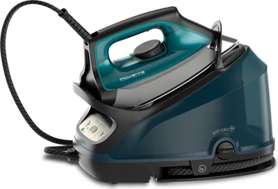 A Rowenta Compact Steam Pro steam generator iron is shown on its base.