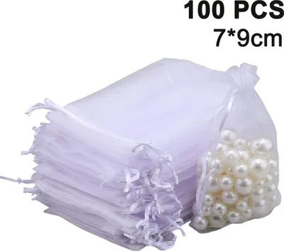 Produktbild von 100 Stück durchsichtige Schmuckbeutel mit Kordelzug, ideal als Gastgeschenke für Hochzeiten, Partys und Weihnachten.