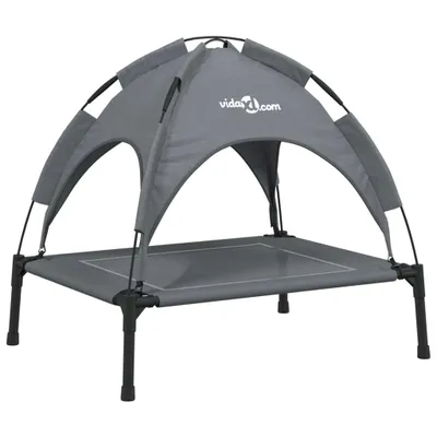 A gray dog bed with a canopy, shown against a white background.