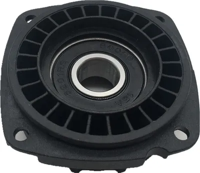 A black bearing flange with a metal bearing inside, shown from a slightly elevated angle against a white background.