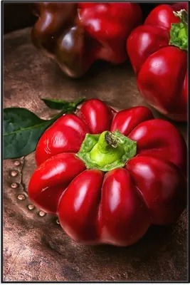 Produktbild von Wallario Wandbild Rote Paprika in der Küche, Größe: 61 x 91,50 cm, Poster mit schwarzem Aluminiumrahmen