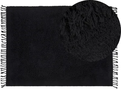 Produktbild von BELIANI Teppich Schwarz Baumwolle Rechteckig 140 x 200 cm mit Fransen Getuftet Boho Langhaar Hochflor Shaggy Bettvorleger Läufer für Fußbodenheizung