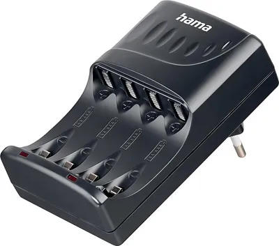 A black battery charger with multiple slots for AA and AAA batteries, plugged into a white wall outlet.