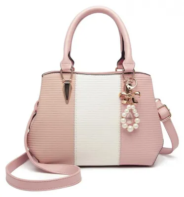 Produktbild von Hellrosa kleine Abendtasche im Kofferformat mit Riffelung von Amoa