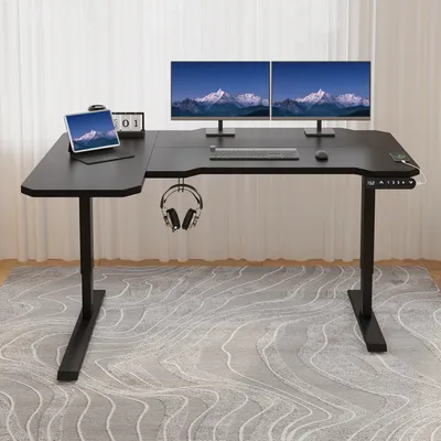 A black L-shaped standing desk with two monitors, a tablet, keyboard, mouse, and headphones.