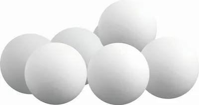 A group of white ping pong balls on a white background.