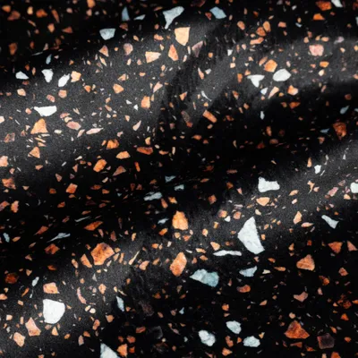 Produktbild von Samtstoff Meterware Polsterstoff Digitaldruck schwarz orange 1,50m
