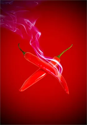 Produktbild von Wallario Poster - Rauchende Chili-Schoten im Duo vor rotem Hintergrund, Kunstdruck Größe: 70 x 100 cm