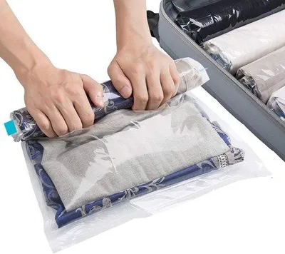 Produktbild von Famanu Vakuumtaschen für Kleidung - 7 Stück - 2 x 30 x 40 cm / 2 x 35 x 50 cm / 2 x 40 x 60 cm / 1 x 50 x 70 cm