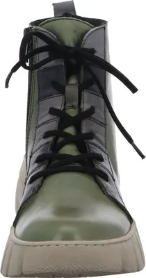 A front view of a green leather boot with black and gray paneling.