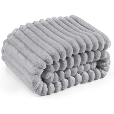 A folded gray blanket with a ribbed texture is shown against a white background.