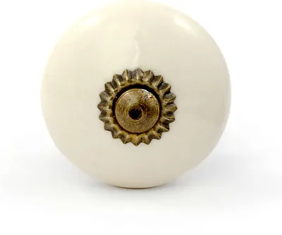 Produktbild von Kleiner Möbelknauf in beige mit Messingrosette