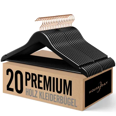 A stack of black wooden hangers with rose gold hooks, displayed on top of their cardboard packaging.