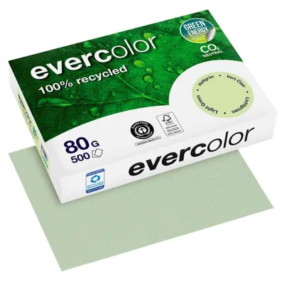 A pack of light green A4 paper with a single sheet placed underneath.