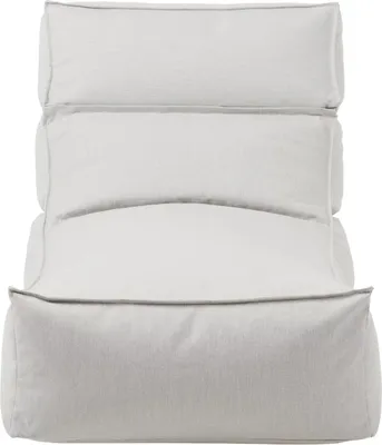 A light gray lounger chair is shown from the front against a white background.
