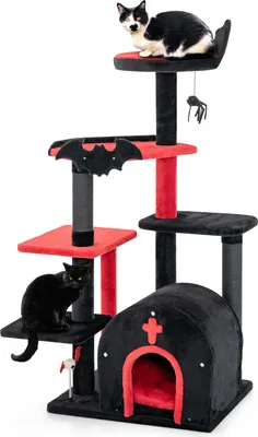 A Halloween-themed cat tree with two cats.