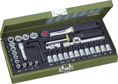 A tool kit in an open green metal case.