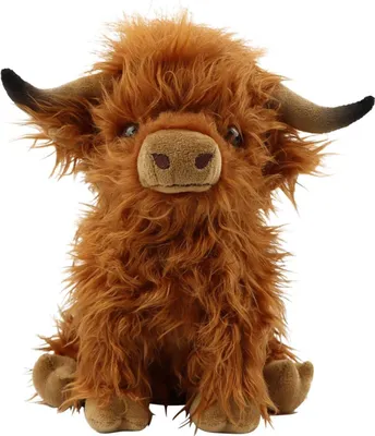 A plush toy Highland cow sitting on a white background.