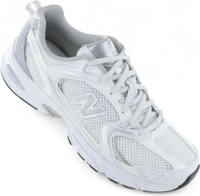 A single white New Balance sneaker is shown against a white background.