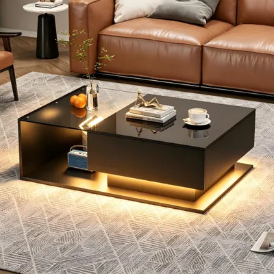 Zdjęcie produktu dla Stolik kawowy, wymiary 100x50x32 cm, wykonany w 100% z płyty wiórowej, kolor czarny, z szklanym blatem, 1 szufladą i oświetleniem LED, blat z wysokopołyskową powierzchnią