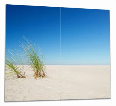 Produktbild von Wallario Herdabdeckplatte aus Glas, Größe 60 x 52 cm 2-teilig, Motiv Sandstrand unter blauem Himmel