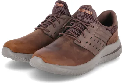 A pair of brown Skechers men's sneakers.