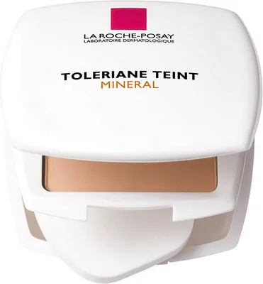 A compact makeup product with a sponge applicator.