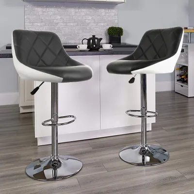 Two modern bar stools in a kitchen setting.