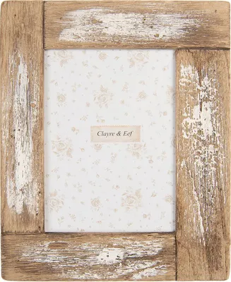 A rustic wooden picture frame with a floral patterned insert.